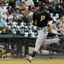 Pittsburgh Pirates' Starling Marte rounds the bases on a solo home run on the first pitch of the first inning in his first appearance with the Pirates in a baseball game, Thursday, July 26, 2012, against the Houston Astros in Houston. (AP Photo/Pat Sullivan)