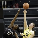Stanford forward Chiney Ogwumike, left, battles for a rebound with Oregon forward Liz Brenner during the first half of an NCAA college basketball game in Eugene, Ore., Friday, Feb. 1, 2013. (AP Photo/Don Ryan)