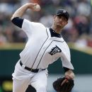 Detroit Tigers starting pitcher Doug Fister throws against the Kansas City Royals in the first inning of a baseball game in Detroit, Thursday, Sept. 27, 2012. (AP Photo/Paul Sancya)