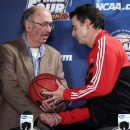 AP Basketball Writer Jim O'Connell, left, is honored by Louisville coach Rick Pitino after a news conference for the NCAA Final Four tournament, Sunday, April 7, 2013, in Atlanta. Louisville plays Michigan in the basketball championship game on Monday. Covering his 35th Final Four, AP Basketball Writer Jim O'Connell was honored by the NCAA and the Final Four coaches today. (AP Photo/Chris O'Meara)