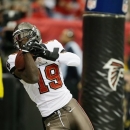Tampa Bay Buccaneers wide receiver Mike Williams (19) makes a touch-down catch during the first half of an NFL football game against the Atlanta Falcons, Sunday, Dec. 30, 2012, in Atlanta. (AP Photo/David Goldman)