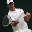 LONDON, ENGLAND - JUNE 26:  Sam Querrey of the USA in action during his Gentlemen's Singles first round match againstVasek Pospisil of Canada on day two of the Wimbledon Lawn Tennis Championships at the All England Lawn Tennis and Croquet Club on June 26, 2012 in London, England.  (Photo by Clive Rose/Getty Images)