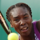 Venus Williams of the U.S. returns in the first round match of the French Open tennis tournament against Sloane Stephens of the U.S. at the Roland Garros stadium, in Paris, France, Monday, May 25, 2015. (AP Photo/Michel Euler)