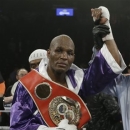 Bernard Hopkins poses for photographs after an IBF Light Heavyweight championship boxing match against Tavoris Cloud at the Barclays Center Saturday, March 9, 2013, in New York. Hopkins won by unanimous decision. (AP Photo/Frank Franklin II)