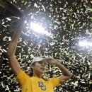 Baylor 's Brittney Griner (42) celebrates their the Big 12 Conference Championship following an NCAA college basketball game against Texas Saturday, Feb. 23, 2013, in Waco, Texas. Baylor defeated Texas 67-47. (AP Photo/Tony Gutierrez)