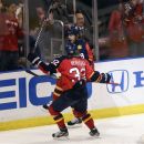 Florida Panthers player Stephen Weiss (9) celebrates his goal with Kris Versteeg (32) during the first period of Game 2 of an NHL hockey Stanley Cup first-round playoff series in Sunrise, Fla., Sunday, April 15, 2012, against the New Jersey Devils. (AP Photo/J Pat Carter)