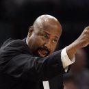 FILE - This March 14, 2012 file photo shows New York Knicks interim head coach Mike Woodson calling out to his team during the first half of an NBA basketball game against the Portland Trail Blazers, in New York. A person with knowledge of the situation says the Knicks and Woodson are finalizing a multiyear deal that could be announced this week. (AP Photo/Frank Franklin II, File)