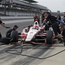 AJ Allmendinger practices a pit stop with his crew during practice for the Indianapolis 500 auto race at the Indianapolis Motor Speedway in Indianapolis, Wednesday, May 15, 2013. (AP Photo/Darron Cummings)