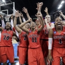 Georgia celebrates after defeating Stanford 61-59 in a regional semifinal in the NCAA women's college basketball tournament Saturday, March 30, 2013, in Spokane, Wash. (AP Photo/Elaine Thompson)