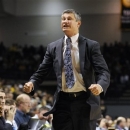 La Salle coach John Giannini reacts to a call during the second half of an NCAA college basketball game against Virginia Commonwealth on Saturday, Jan. 26, 2013, in Richmond, Va. (AP Photo/Clement Britt)