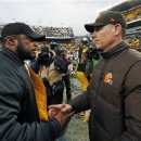 Pittsburgh Steelers head coach Mike Tomlin, left, shakes hands with Cleveland Browns head coach Pat Shurmur after the Steelers' 24-10 win in an NFL football game in Pittsburgh, Sunday, Dec. 30, 2012. (AP Photo/Gene J. Puskar)