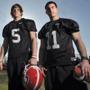FILE - In this Feb. 26, 2010, file photo, Georgia quarterbacks Zach Mettenberger (5) and Aaron Murray (11) pose for a photo in Athens, Ga. Murray won the job, guided Georgia back to national prominence, and became the most prolific passer in school history. Mettenberger ran into legal troubles, was forced out of Athens, and landed as the starter for Southeastern Conference rival LSU. On Saturday, these former teammates will go against each other for the first time when Georgia hosts LSU. (AP Photo/Atlanta Journal Constitution, Brant Sanderlin, File)