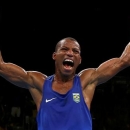 2016 Rio Olympics - Boxing - Semifinal - Men's Light (60kg) Semifinals Bout 181 - Riocentro - Pavilion 6 - Rio de Janeiro, Brazil - 14/08/2016. Robson Conceicao (BRA) of Brazil reacts after winning his bout. REUTERS/Peter Cziborra