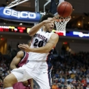 Gonzaga's Elias Harris (20), of Germany, inbounds a ball during the second half of a West Coast Conference tournament NCAA college basketball game against Loyola Marymount, Saturday, March 9, 2013, in Las Vegas. Gonzaga defeated Loyola Marymount 66-48. (AP Photo/Isaac Brekken)