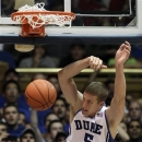 Duke's Mason Plumlee (5) dunks against Ohio State during the second half of an NCAA college basketball game in Durham, N.C., Wednesday, Nov. 28, 2012. Duke won 73-68. (AP Photo/Gerry Broome)