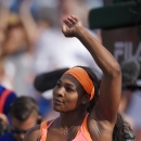 Serena Williams celebrates after defeating Zarina Diyas, of Kazakhstan, in their match at the BNP Paribas Open tennis tournament, Sunday, March 15, 2015, in Indian Wells, Calif. (AP Photo/Mark J. Terrill)