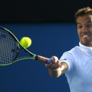 Richard Gasquet of France makes a forehand return to Kevin Anderson of South Africa during their third round match at the Australian Open tennis championship in Melbourne, Australia, Friday, Jan. 23, 2015. (AP Photo/Vincent Thian)
