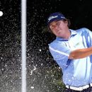 Jason Dufner hits out of a bunker onto the eighth green during the second round of the PGA Colonial golf tournament Friday, May 25, 2012, in Fort Worth, Texas.  (AP Photo/Tony Gutierrez)