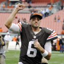 Cleveland Browns quarterback Brian Hoyer runs off the field after a 17-6 win over the Cincinnati Bengals in an NFL football game on Sunday, Sept. 29, 2013, in Cleveland. (AP Photo/David Richard)