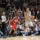 SAN ANTONIO, TX - FEBRUARY 2:  Tim Duncan #21 of the San Antonio Spurs protects the ball from Emeka Okafor #50 of the Washington Wizards during the game between the Washington Wizards and the San Antonio Spurs on February 2, 2013 at the AT&T Center in San Antonio, Texas