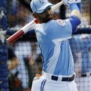 American League's Jose Bautista, of the Toronto Blue Jays, warms up during MLB All-Star baseball batting practice, Monday, July 9, 2012, in Kansas City, Mo. (AP Photo/Jeff Roberson)