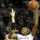Kentucky's DeNesha Stallworth (11) shoots under pressure from Georgia's Anne Marie Armstrong during the first half of an NCAA college basketball game at Memorial Coliseum in Lexington, Ky., Sunday, Feb. 3, 2013. (AP Photo/James Crisp)
