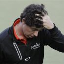 Rory McIlroy, of Northern Ireland, reacts after bogeying the 18th hole during the first round of the U.S. Open Championship golf tournament Thursday, June 14, 2012, at The Olympic Club in San Francisco. (AP Photo/Eric Risberg)