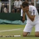 Jerzy Janowicz of Poland reacts after beating Jurgen Melzer of Austria during their Men's singles match at the All England Lawn Tennis Championships in Wimbledon, London, Monday, July 1, 2013. (AP Photo/Anja Niedringhaus)