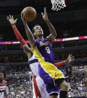 Video: NICK YOUNG goes over the backboard on a wide-open layup 'attempt'