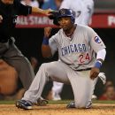 ANAHEIM, CA - FILE: National League All-Star Marlon Byrd #24 of the Chicago Cubs slides in safe at home plate to score the third run for the National League in the seventh inning of the 81st MLB All-Star Game at Angel Stadium of Anaheim on July 13, 2010 in Anaheim, California. According to reports on June 25, 2012, Byrd has been suspended for 50 games after testing positive for Tamoxifen. (Photo by Stephen Dunn/Getty Images)