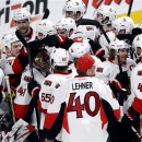 Ottawa Senators celebrate after defeating the Montreal Canadiens 6-1 in Game 5 first round NHL hockey Stanley Cup playoff series, Thursday, May 9, 2013, in Montreal. Ottawa wins the series four games to one. (AP Photo/The Canadian Press, Ryan Remiorz)