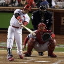 St. Louis Cardinals' Carlos Beltran hits a single during the third inning of Game 4 of baseball's World Series against the Boston Red Sox Sunday, Oct. 27, 2013, in St. Louis. (AP Photo/Charlie Riedel)