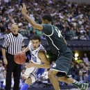 Duke guard Seth Curry (30) drives around Michigan State guard Gary Harris (14) during the second half of a regional semifinal in the NCAA college basketball tournament, Friday, March 29, 2013, in Indianapolis. (AP Photo/Michael Conroy)