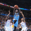 OKLAHOMA CITY, OK - MARCH 19: Ty Lawson #3 of the Denver Nuggets goes up for the layup in traffic against the Oklahoma City Thunder during an NBA game on March 19, 2013 at the Chesapeake Energy Arena in Oklahoma City, Oklahoma. (Photo by Layne Murdoch Jr./NBAE via Getty Images)