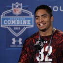 Notre Dame linebacker Manti Te'O answers a question during a news conference at the NFL football scouting combine in Indianapolis, Saturday, Feb. 23, 2013. (AP Photo/Michael Conroy)