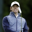 Rory McIlroy, of Northern Ireland, reacts after missing a putt on the 12th hole during the second round of the Wells Fargo Championship golf tournament at Quail Hollow Club in Charlotte, N.C., Friday, May 3, 2013. (AP Photo/Chuck Burton)