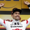 Cycling - Tour de France cycling race - The 184.5 km (114.6 miles) Stage 9 from Vielha Val d'Aran, Spain to Andorre Arcalis, Andorra - 10/07/2016 Team Giant-Alpecin rider Tom Dumoulin of The Netherlands reacts on the podium.   REUTERS/Juan Medina