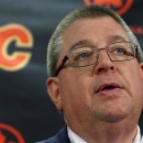 Calgary Flames general manager Jay Feaster speaks to the media following the team's announcement trading captain Jarome Iginla to the Pittsburgh Penguins, in Calgary, Alberta, Wednesday, March 27, 2013. The Flames have trade Iginla in exchange for forwards Kenneth Agostino and Ben Hanowski and the Pittsburgh Penguins 2013 first round pick. (AP Photo/The Canadian Press, Jeff McIntosh)