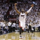 Miami Heat shooting guard Dwyane Wade (3) reacts to play against the Indiana Pacers during the second half of Game 7 in their NBA basketball Eastern Conference finals playoff series, Monday, June 3, 2013 in Miami. (AP Photo/Lynne Sladky)