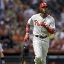 Philadelphia Phillies' Domonic Brown watches his two-run home run during the seventh inning of a baseball game against the Houston Astros on Friday, Sept. 14, 2012, in Houston. (AP Photo/David J. Phillip)