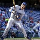 Los Angeles Dodgers' A.J. Ellis reacts as he is hit by a pitch during the second inning of the first baseball game of a doubleheader against the Washington Nationals at Nationals Park Wednesday, Sept. 19, 2012, in Washington. (AP Photo/Alex Brandon)