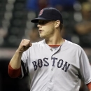 Boston Red Sox relief pitcher Andrew Bailey pumps his fist after the final out in a 6-3 win over the Cleveland Indians in a baseball game on Thursday, April 18, 2013, in Cleveland. Bailey got the save and Boston swept the three-game series. (AP Photo/Mark Duncan)