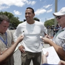 New York Yankees third baseman Alex Rodriguez talks to the media after reporting to the Yankees' Minor League complex for rehabilitation Monday, May 6, 2013, in Tampa, Fla. Rodriguez is rehabbing from hip surgery. (AP Photo/Chris O'Meara)