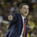 Louisville head coach Rick Pitino reacts to play against Wichita State during the first half of the NCAA Final Four tournament college basketball semifinal game Saturday, April 6, 2013, in Atlanta.  (AP Photo/John Bazemore)