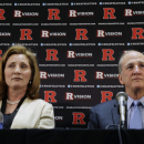 Julie Hermann, left, sits with Rutgers president Roberet L. Barchi, as they listen to a question during a news conference where she was introduced as the new athletic director at Rutgers University on Wednesday, May 15, 2013, in Piscataway, N.J.  Hermann was a senior associate athletic director and senior woman administrator at the University of Louisville. Rutgers has been looking for a new AD since Tim Pernetti resigned on April 5, part of the fallout from the Mike Rice scandal. (AP Photo/Mel Evans)