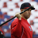 St. Louis Cardinals right fielder Carlos Beltran lifts an iron bar during batting practice before Game 5 of baseball's World Series against the Boston Red Sox, Monday, Oct. 28, 2013, in St. Louis. (AP Photo/Matt Slocum)