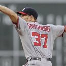 Washington Nationals starting pitcher Stephen Strasburg delivers to the Boston Red Sox during the first inning of a baseball game at Fenway Park, Friday, June 8, 2012, in Boston.  (AP Photo/Charles Krupa)