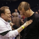 Michigan State head coach Tom Izzo, left, and Oregon head coach Dana Altman talk during practices for their regional semifinal games in the NCAA college basketball tournament Thursday, March 28, 2013, in Indianapolis. Michigan State plays Duke and Oregon plays Louisville on Friday. (AP Photo/Michael Conroy)