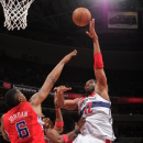 WASHINGTON, DC - FEBRUARY 4: NenÃª #42 of the Los Angeles Clippers attempts a hook shot against DeAndre Jordan #6 of the Washington Wizards on February 4, 2013 at the Verizon Center in Washington, DC.  (Photo by Andrew D. Bernstein/NBAE via Getty Images)
