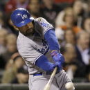 Los Angeles Dodgers' Matt Kemp hits a double off of San Francisco Giants pitcher Barry Zito to score Yasiel Puig during the fourth inning of a baseball game in San Francisco, Wednesday, Sept. 25, 2013. (AP Photo/Jeff Chiu)